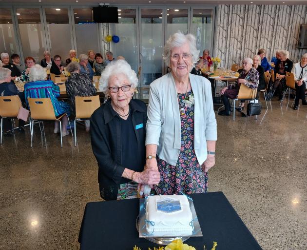 Cutting the cake to mark the 120th anniversary of the establishment of the South Canterbury Women...