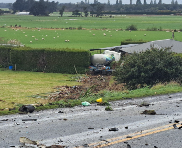 The truck crashed into a house after colliding with a car on State Highway 1 at Edendale. Photo:...