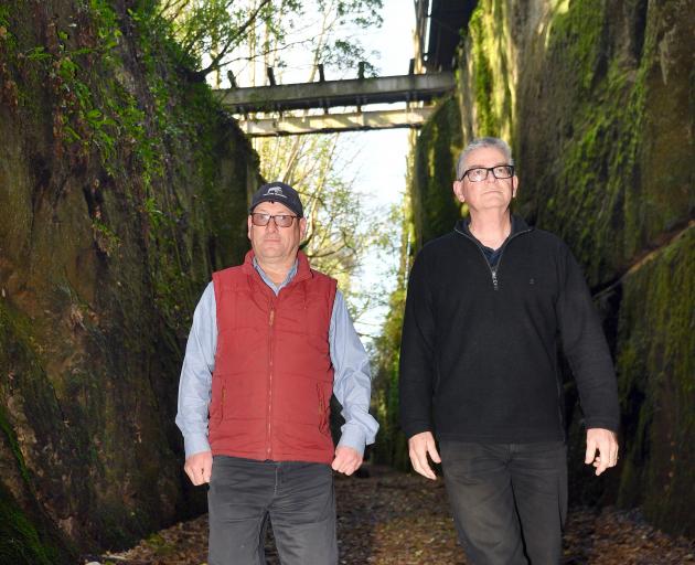 Dunedin Tunnels Trail Trust members Brent Irving (left) and Gerard Hyland are urging action be...