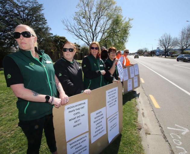 Workers from the Woolworths supermarket in Amberley. PHOTO: JOHN COSGROVE