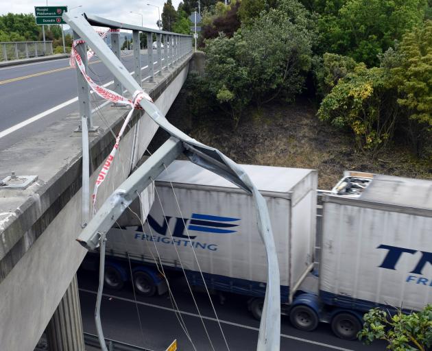 A damaged barrier on a section of Quarry Road Bridge in Mosgiel on Tuesday.PHOTO: SHAWN MCAVINUE