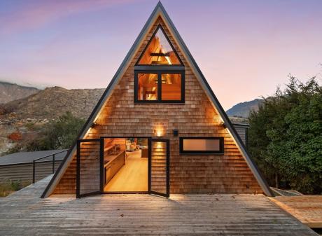 This A-frame house, renovated by Velvin Building, offers modern comforts and gives a nod to...