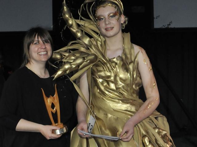 Rangiora artist, Mel Eaton with her design Rumplestiltskin, modelled by Reece Hunter, which won...