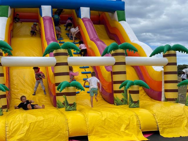 Fun and games . . . An inflatable slide was a popular drawcard for youngsters during the Brighton...