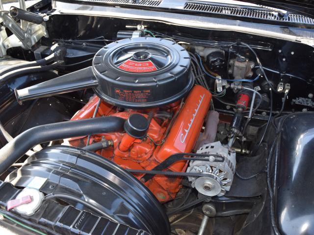 ‘Comfortable and cruisy’ . . . The engine of Mr Clarke’s 1961 Chevrolet Impala.