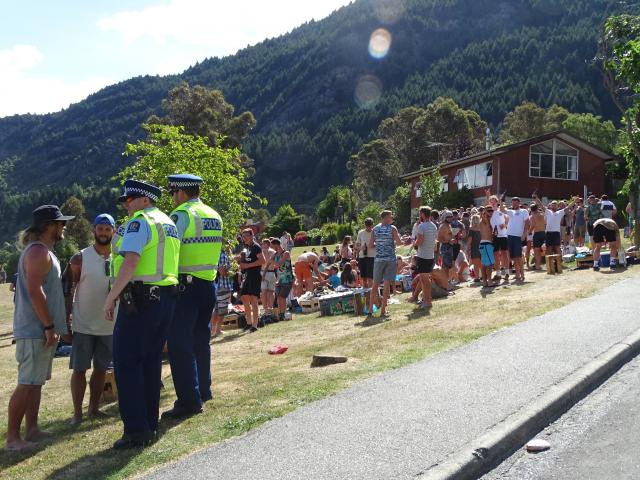 Queenstown police keep a close eye on Crate Day celebrations at Sunshine Bay on Saturday. PHOTO:...