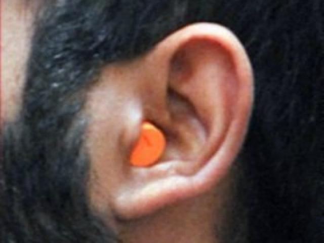Skantha’s bright orange earplugs. PHOTO: CHRISTINE O’CONNOR