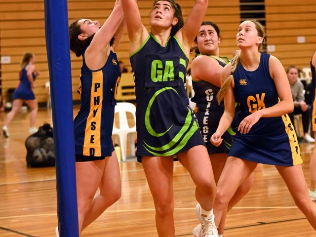 College A goal attack Kiana Pelasio looks for the shot during the Dunedin premier club netball...