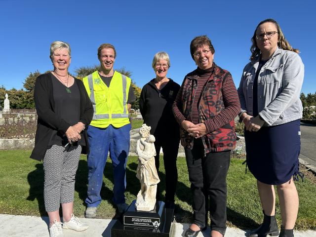 Pam Lafferty, Hayden Stephen, Dianne Hamlin, Laurel Turnbull and Nicky Coats stand beside the new...