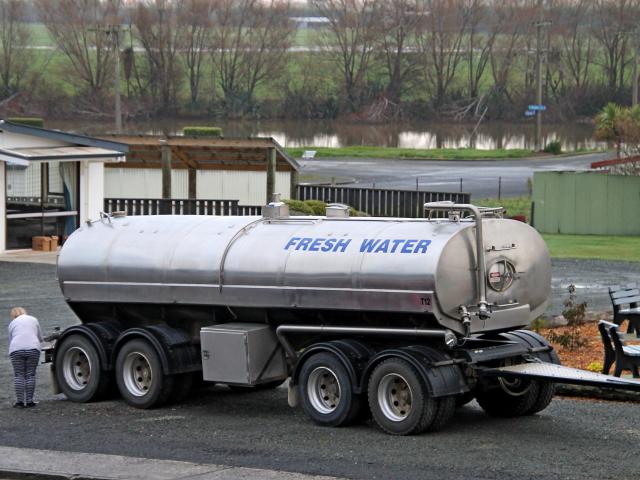 A water tanker sits in Kaitangata yesterday as the town’s water supply is affected by a low...
