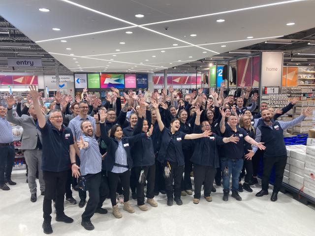 Kmart staff welcome customers with open arms at the new Dunedin store this morning. Photo:...