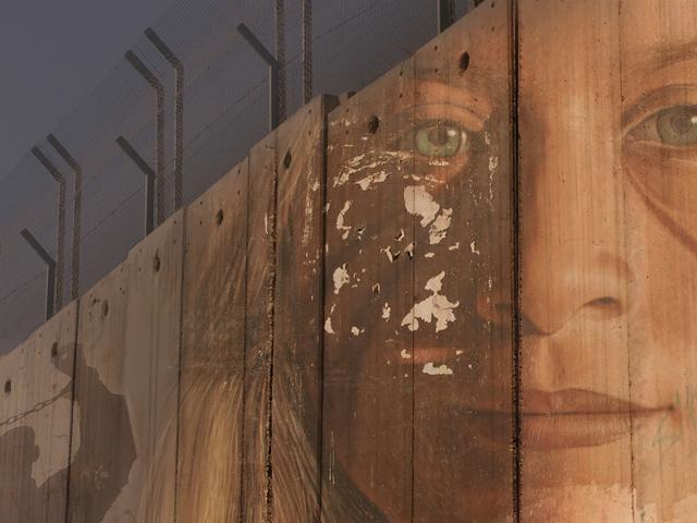 A mural of Ahed Tamimi, who was arrested for slapping an Israeli soldier, by Italian artist Jorit...