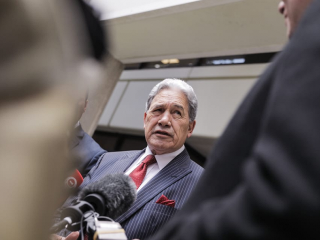 NZ First leader Winston Peters speaks to media after emerging from his party's temporary offices...