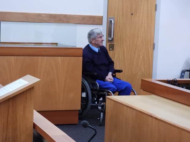 Just Standfast sits in a wheelchair beside the dock in the Greymouth District Court yesterday....