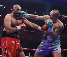 Tyson Fury (left) during his last bout with Oleksandr Usyk. Photo: Getty Images