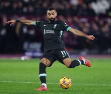 Mohamed Salah strikes for Liverpool during their 5-0 win over West Ham. Photo: Getty Images