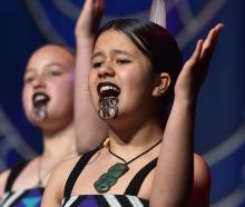 Kara-Lee Kake (left) and Tui Peke, of Te Kura Kaupapa Māori o Ōtepoti, perform. PHOTOS: PETER...