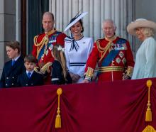 Princess Catherine (centre) joined King Charles and Queen Camilla (right) along with husband...
