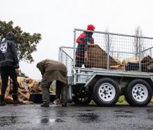 Piles of rubbish line the streets after hundreds of Wairoa properties were flooded last week....