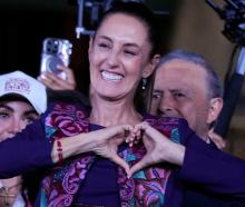 Claudia Sheinbaum gestures to supporters in Mexico City after winning the presidential election....