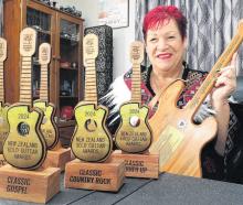 Sharon Russell with the awards she won at the New Zealand Gold Guitar Awards in Gore. PHOTO: JOHN...