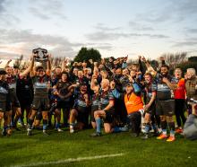 Pirates Old Boys celebrate winning the Galbraith Shield on Saturday. PHOTO: DAKOTA BROWN