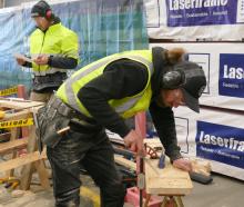 Building apprentices Chris Miller, of Dunedin, foreground, and James Isted-Salmon, of Queenstown,...