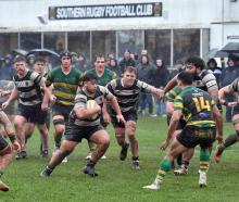 Action from today's Dunedin premier club rugby match between Southern and Green Is at Bathgate...