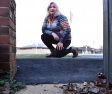 A raised footpath outside Bridgette Beckingham’s property in Argyle St, Mosgiel, may have to be...