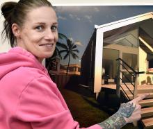 Able Abodes managing director Cyndee Elder with an image featuring housing units she has...
