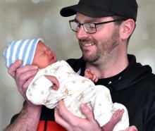 Daniel Parkes celebrates the birth of his son Otis at Dunedin Hospital yesterday. PHOTO: PETER...