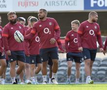 Ollie Lawrence carries the ball during the England captain’s run at Forsyth Barr Stadium...