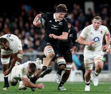 Scott Barrett on the attack in the first test against England at Forsyth Barr Stadium. Photo:...