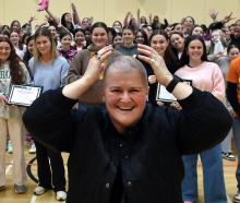 Queen’s High School deputy principal Stephanie Ashton after she received a hair cut at assembly...