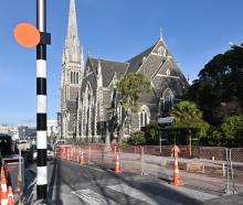 Road cones are back in the Knox block of George St, Dunedin, within a year of the upgraded...