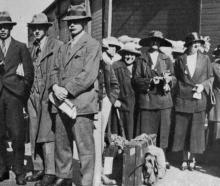 British ex-public school boys (left) and young Scotswomen, latest immigrants to New Zealand. —...