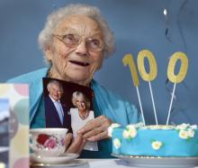 Dunedin woman Irene Chapman, nee Hanson, holds a card from King Charles marking her 100th...