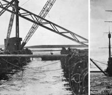 Crane barges are prepared to lift scuppered German WW1 naval vessels from the seabed of Scapa...