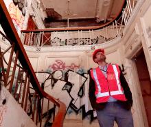 Giles Southwell examines the former theatre's stairwell. PHOTO: GEOFF SLOAN