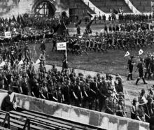 The contingent of Scouts from New Zealand enters Wembley Stadium, London for the Boy Scouts’...