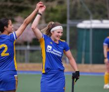 Otago players Rose Parkinson (left) and Tessa Jopp celebrate victory at the national...