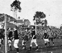 A corner kick by Ting, of the combined Chinese universities team, bounces off the crossbar in the...