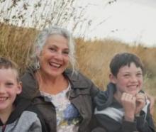 Cora Torr with two of her grandchildren. Photo: Cartwright Creative Imagery