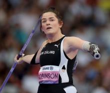 Holly Robinson competing in the Women's Javelin Throw - F46 Final at Stade de France. Photo:...