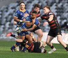 Otago winger Jona Nareki flicks the ball in today's NPC match against Canterbury at Forsyth Barr...