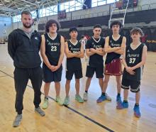 Representing the Aurora College 3x3 boys’ basketball team at the tournament are (from left) coach...