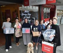 HeadQuarters Hairdressing George St staff (from left) Sariah Krueger, Tania Downer, Isabelle...