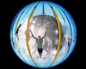 New Zealand swimming star Lewis Clareburt competes in the 200m butterfly final.