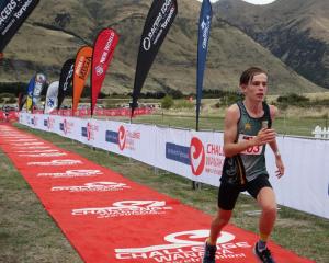 George Abbott (Bayfield High School) finishes his run at Challenge Wanaka. PHOTO: SUPPLIED