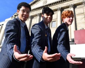 King’s High School choristers (from left) Michael Aitcheson, 16, Ashane De Silva, 17, and Caleb...